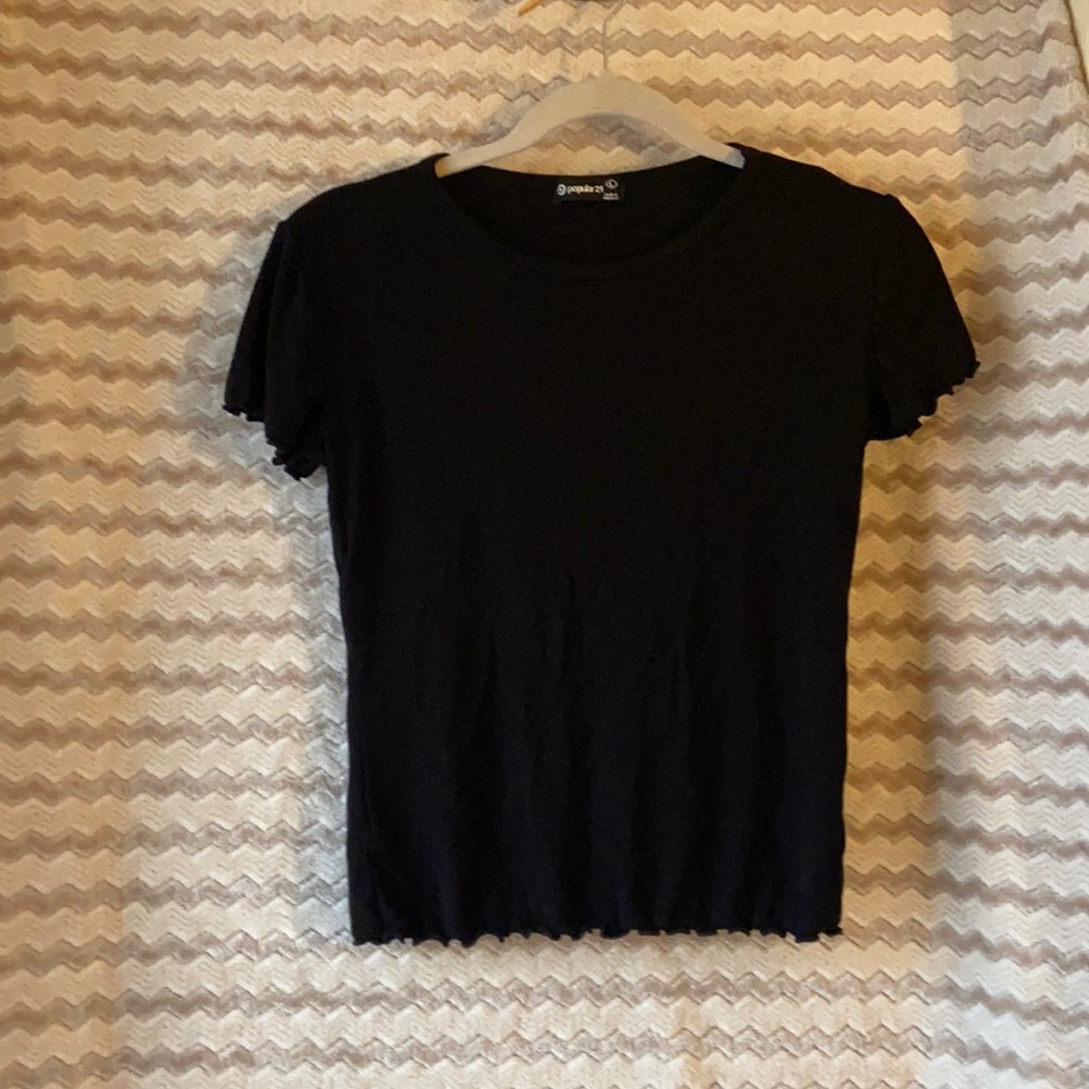 Plain black top with lettuce hem